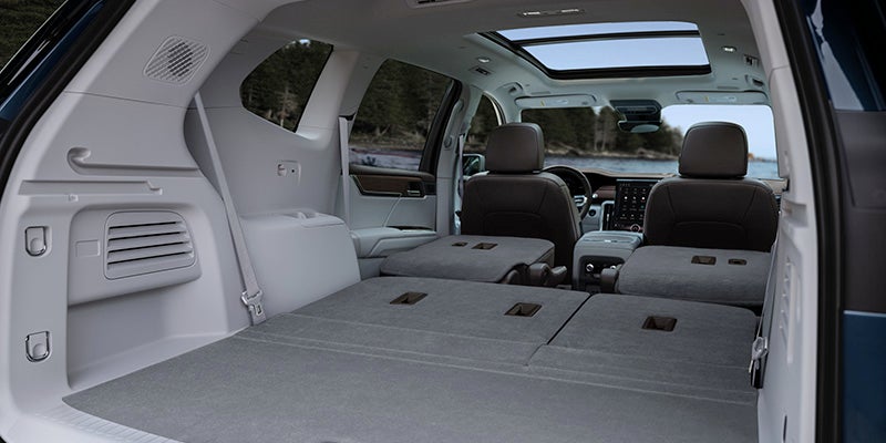 Interior view of the GMC Acadia showcasing its rear seating and spacious backseat area.